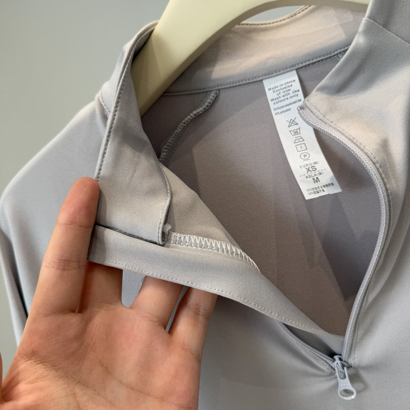 เสื้อยืดแขนยาวคอตั้งแบบซิปครึ่ - Fitness Yoga บทวิจารณ์และราคา